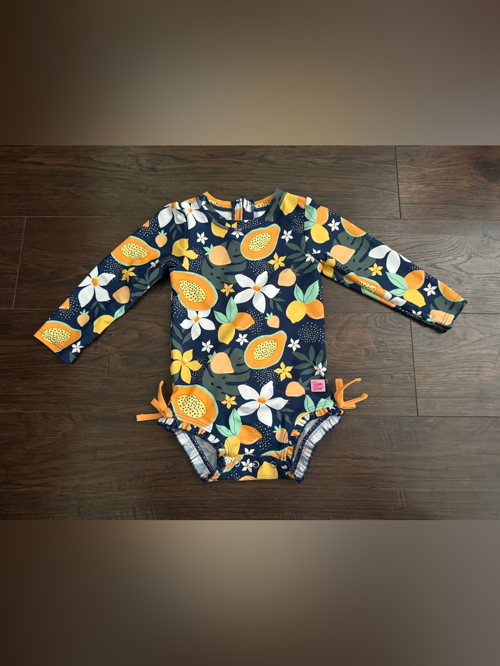 Ruffle Butts Navy Long Sleeve Tropical Fruit Rashguard
